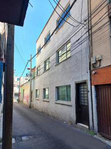 Edificio de vivienda unifamiliar con 6 departamentos en venta, en Mixcoac Benito Juárez, CDMX, 444 mt2, 3 recamaras