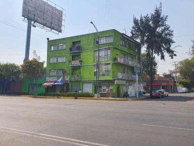 Edificio en venta con departamentos y locales comerciales., 955 mt2