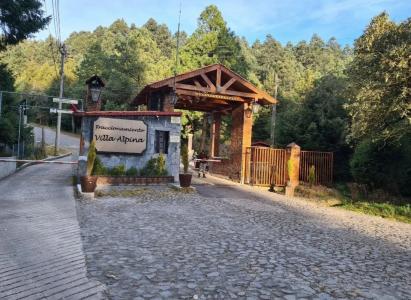 Villa Alpina: Terreno en venta en zona boscosa